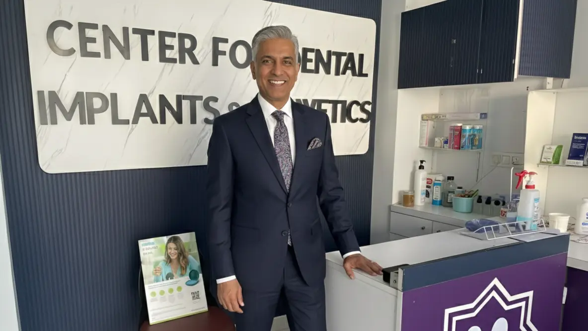 Patient smiling after dental implant treatment at Center for Dental Implants and Esthetics Gurgaon